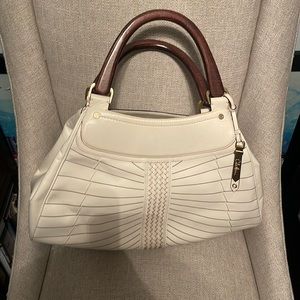 Cole Haan large leather purse off white wooden handles. Gently used vintage